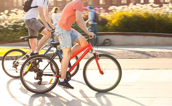 two men on bikes