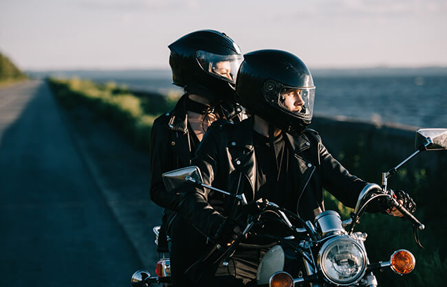 two people on a motorcycle